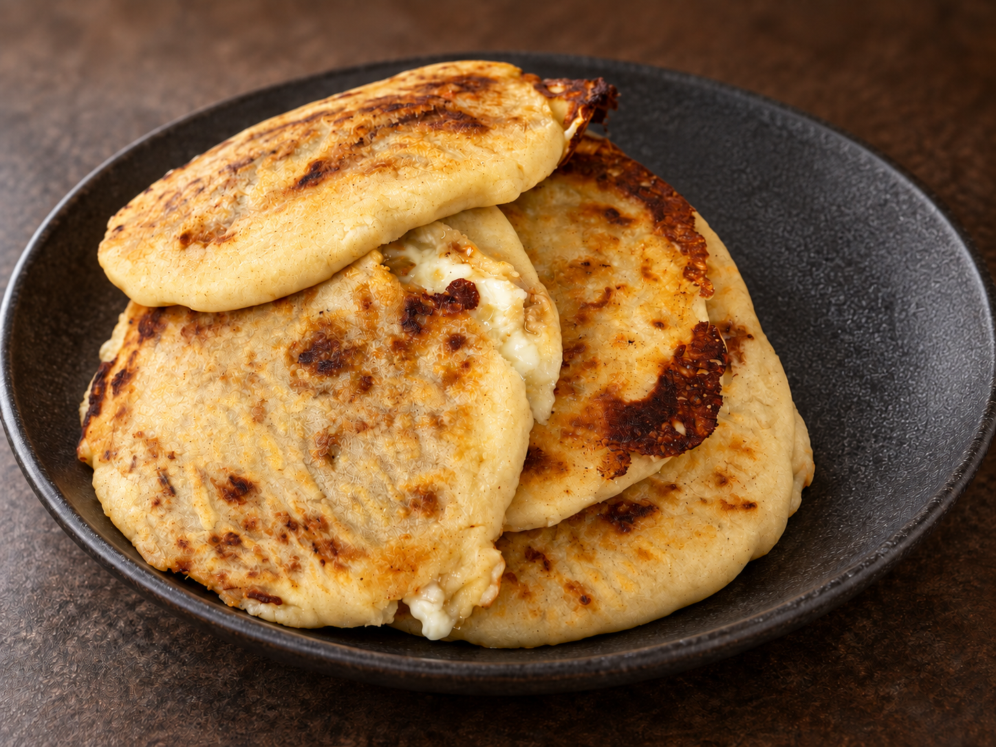 Golden griddled pupusas